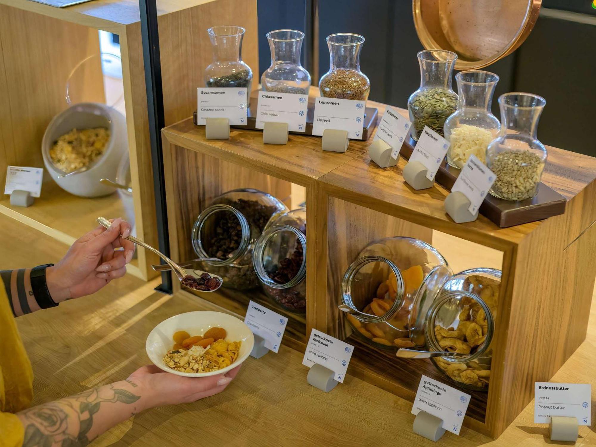 Novotel Muenchen Airport - Newly Renovated Freising Exterior foto Breakfast buffet with various healthy options
